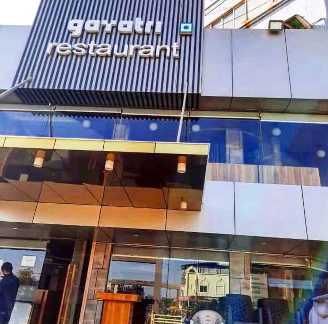 Gayatri Restaurant glass-fronted facade during the day